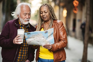 couple with map and a coffee cup