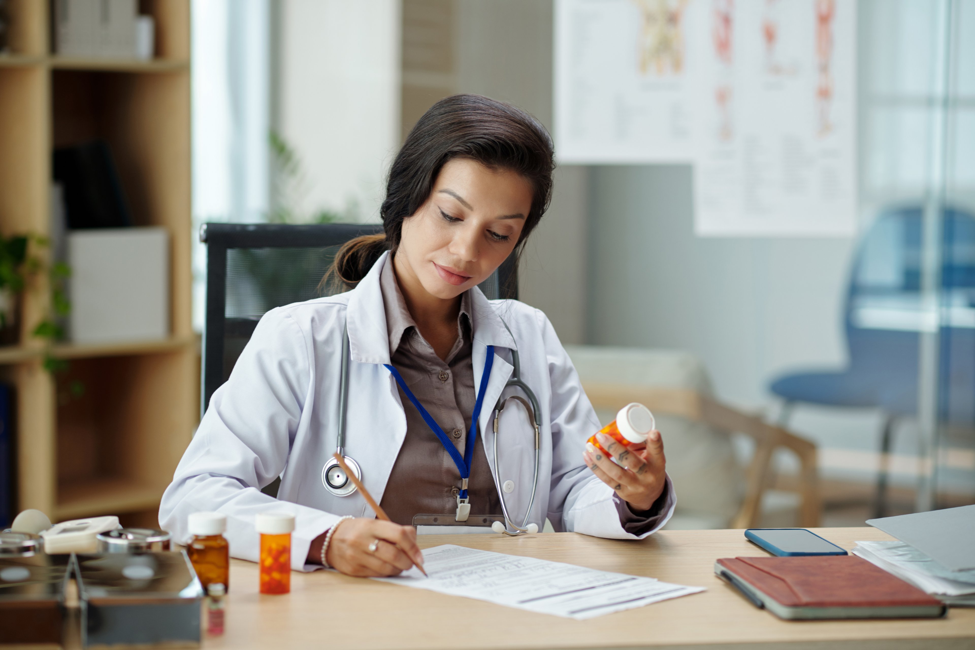 A doctor writing a prescription.