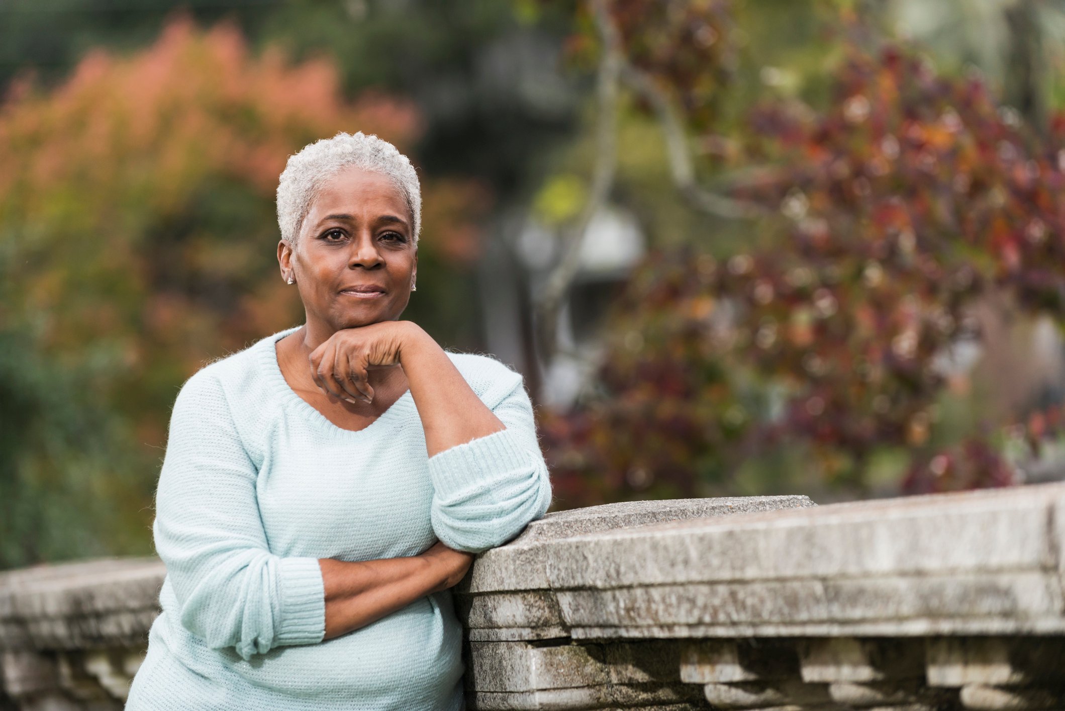 Getty - thoughtful older person outside at the park