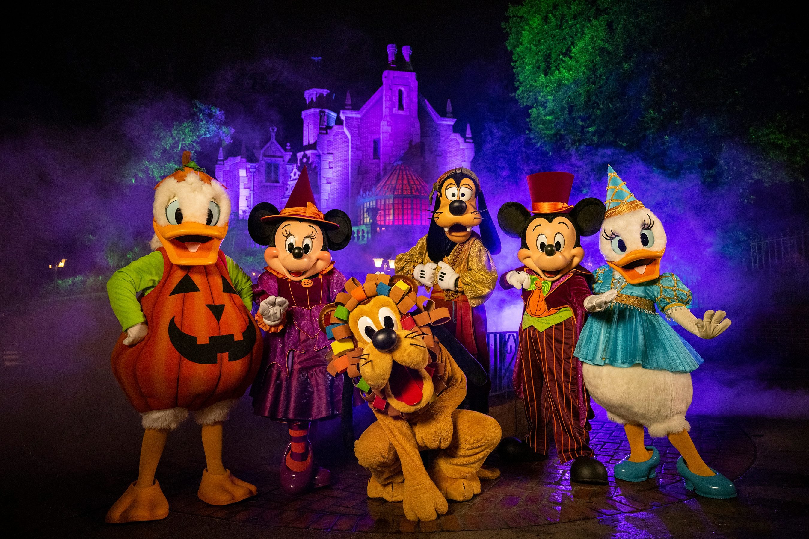 Mickey and his friends dressing up for Disney's Halloween festivities.