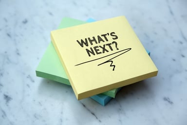 Sticky note with whats next written on it