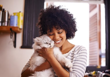 pets_woman hugs cat