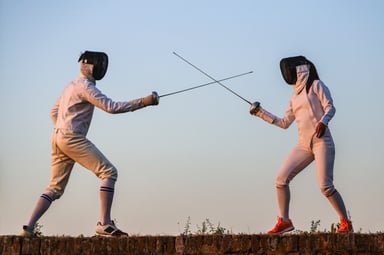 two people fencing sword fight battle