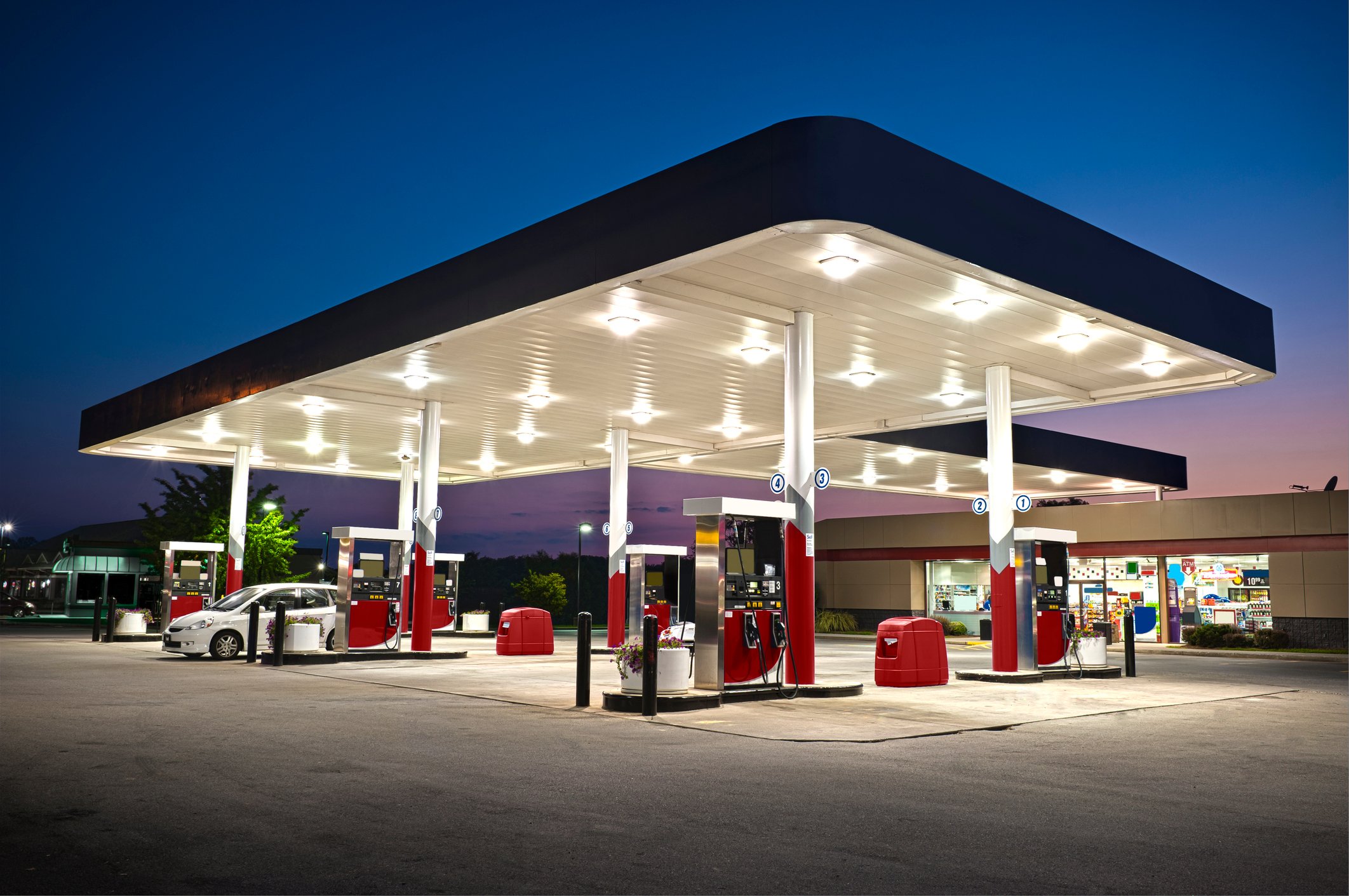 convenience store and gas pumps