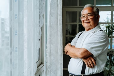 Getty - smiling senior with arms crossed