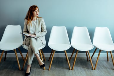 person in waiting room looking to side