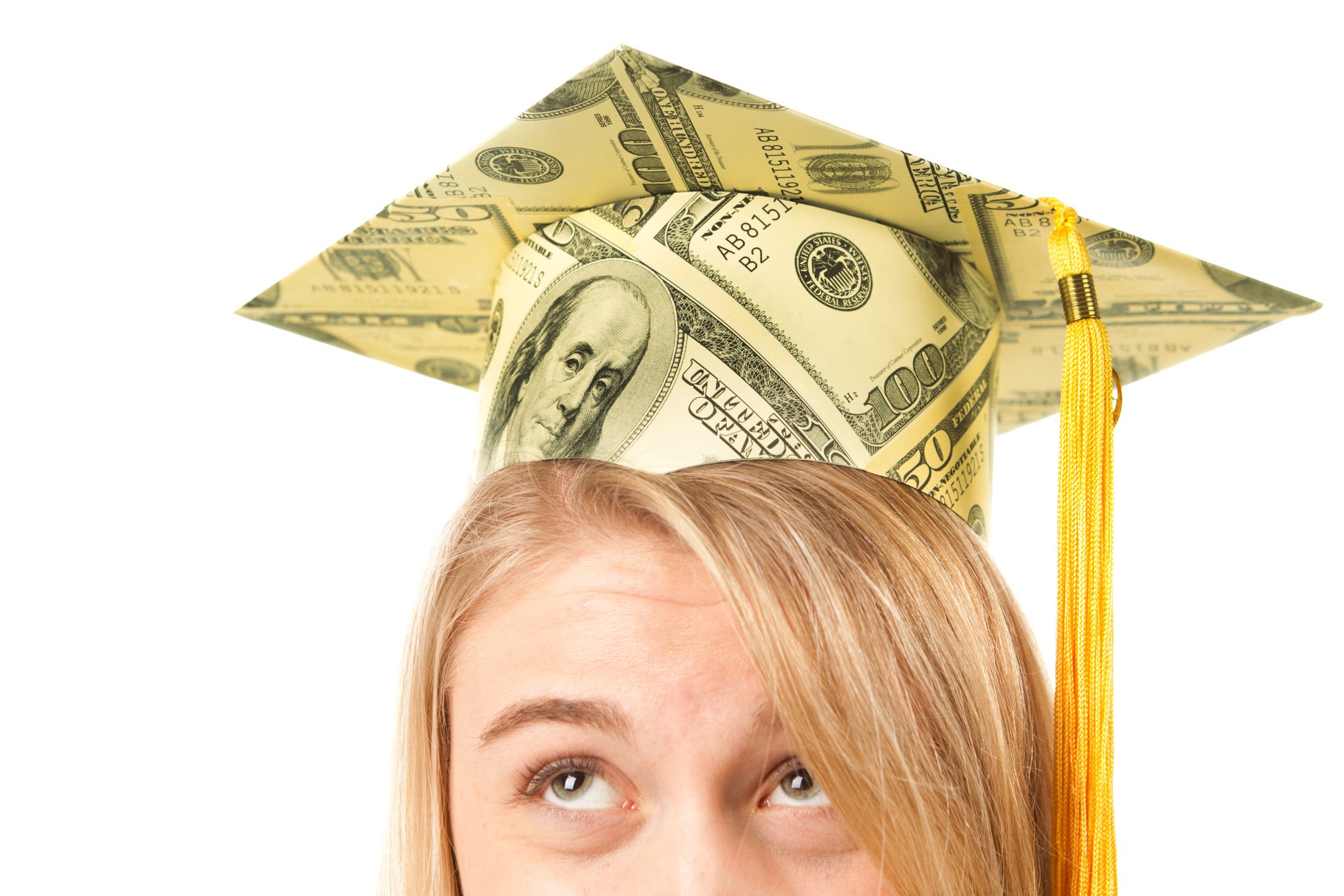 A person wearing a mortarboard with a pattern of $100 bills.
