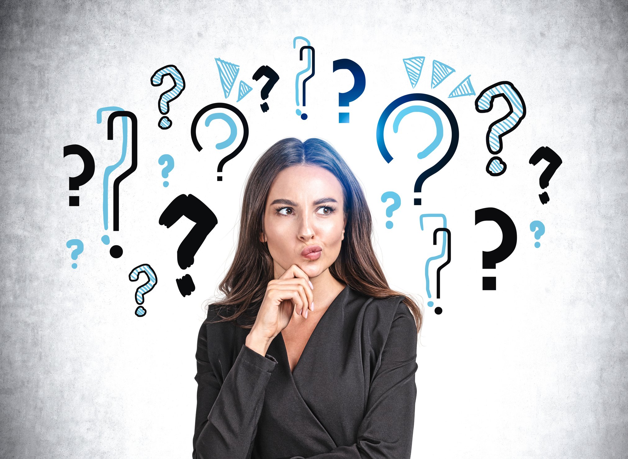 A person with question marks above their head. 