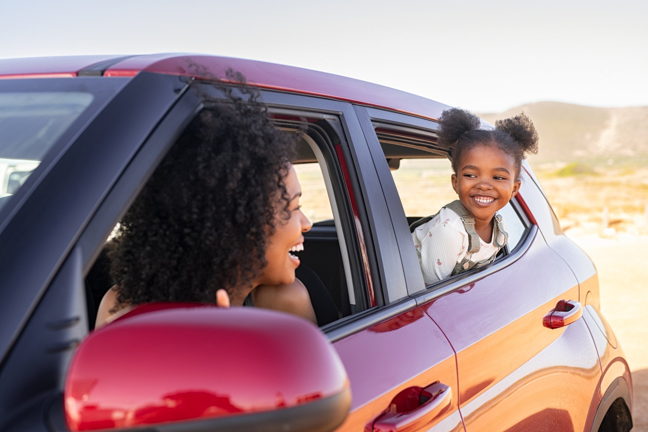 mother daughter road trip in car