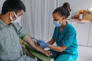 Nurse Prepping a blood draw