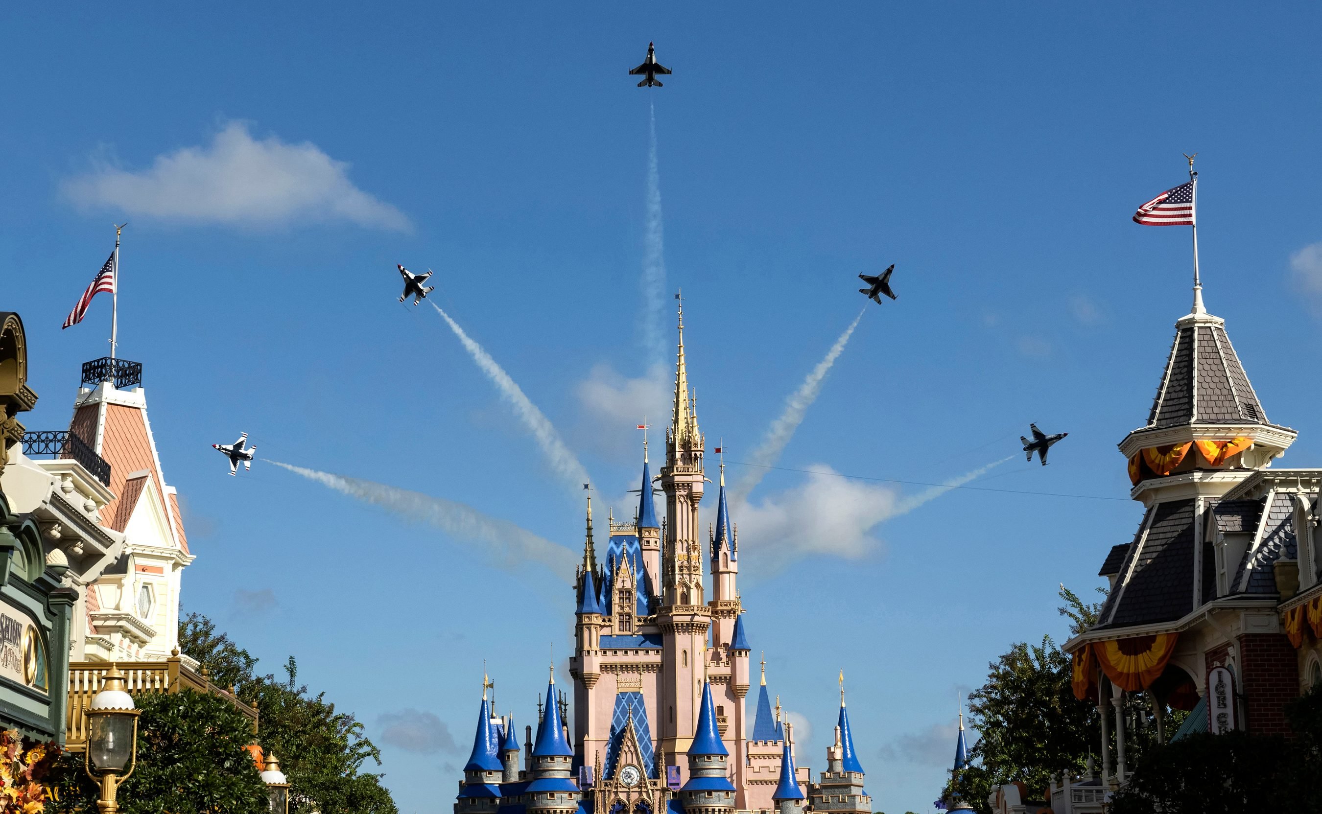 U.S. Air Force Thunderbirds perform a fly over at Disney World's Magic Kingdom. 