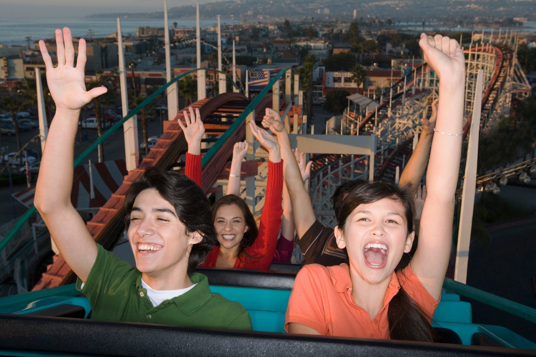 Group of people riding a rollercoaster