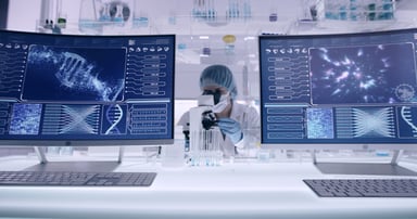 Scientist, monitors with DNA