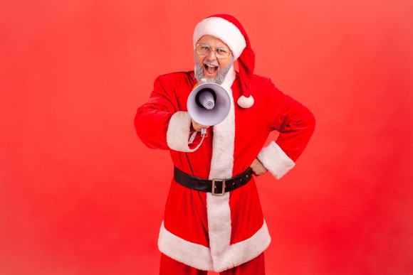 A Santa Claus with a megaphone