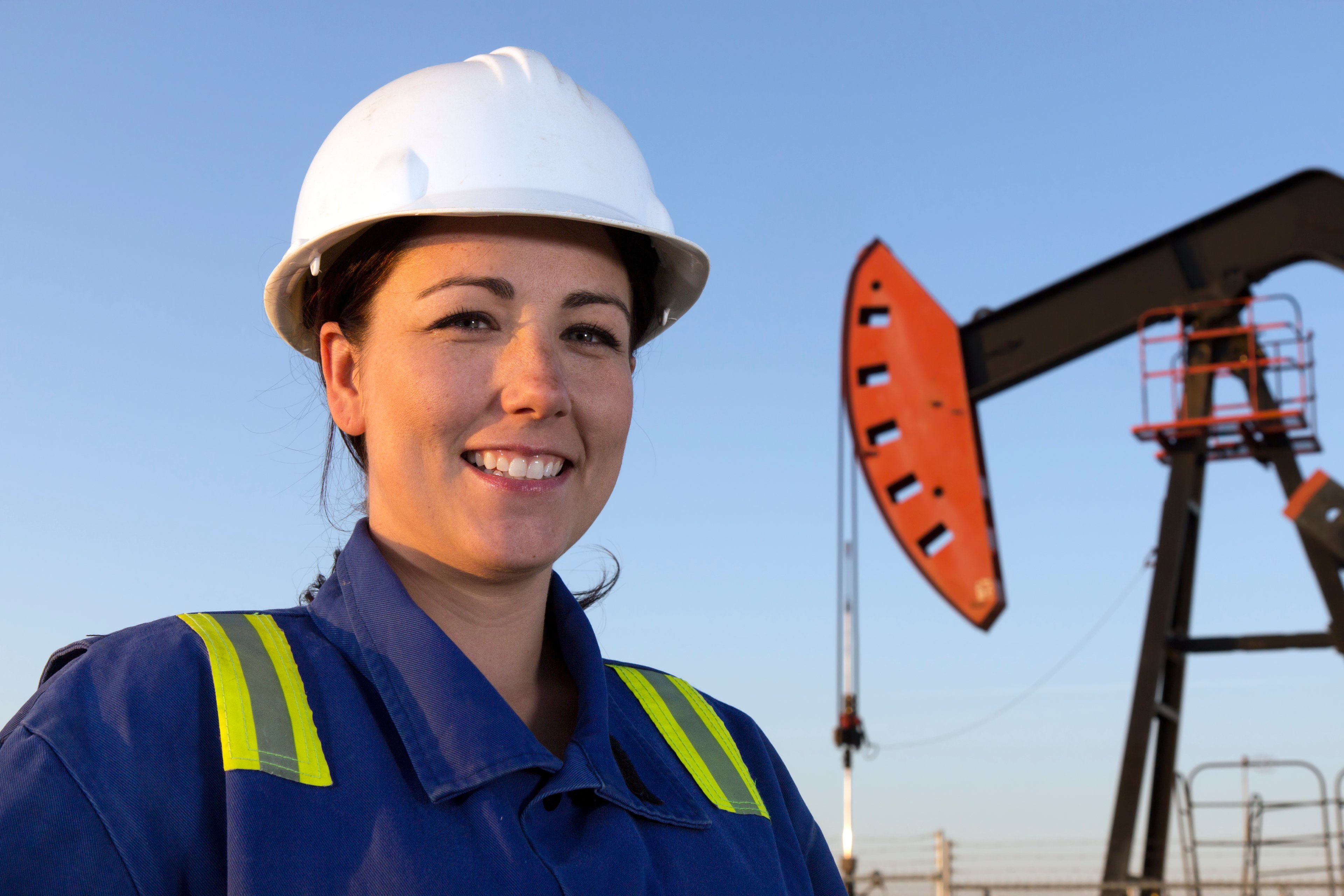 oil pumpjack and worker