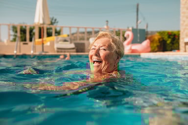 vacationer enjoying time in the pool