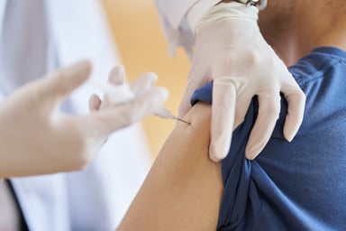 Person getting vaccinated.
