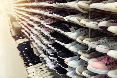shoes on shelves at store