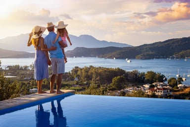 Family standing watching a sunset