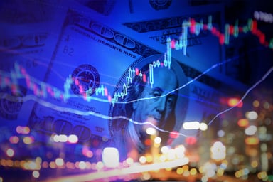 Chart lines and a hundred-dollar bill.