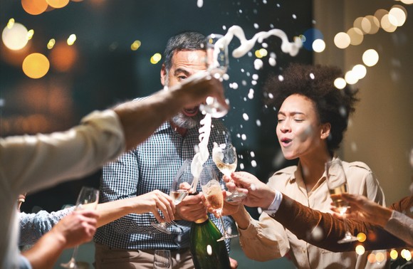 Group of people drinking champagne.