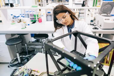 scientist configures tilting machine