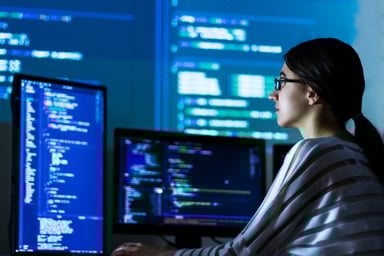 worker analyzes data in war room