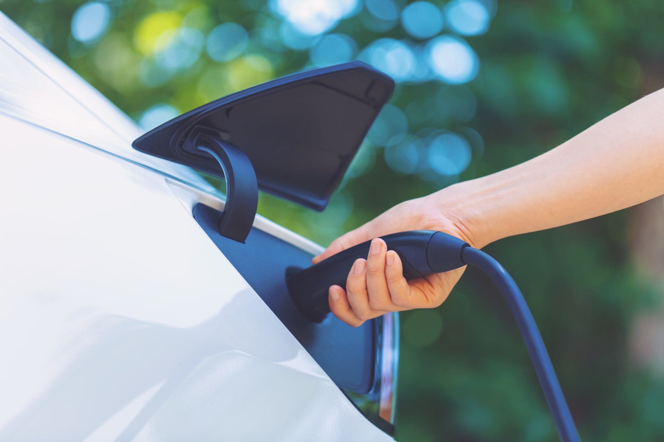 Car Being Charged Outside