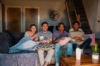 friends watching movie night streaming