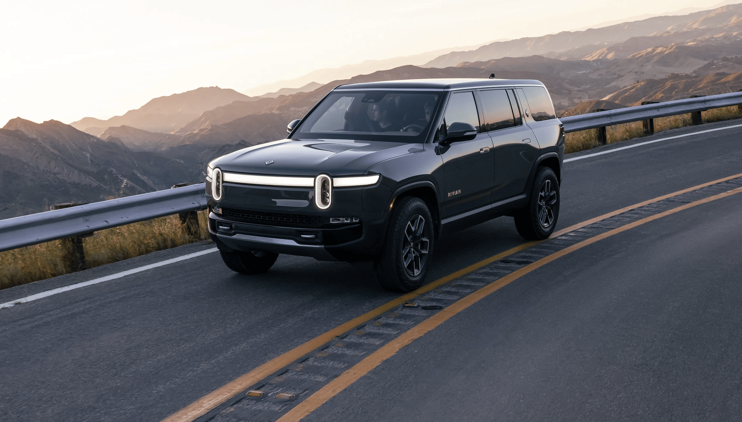 Rivian R1S on scenic road