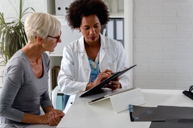 Doctor showing patient a chart