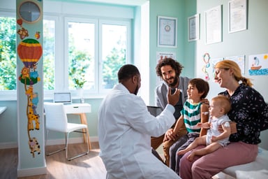 Doctor discussing results with a family.