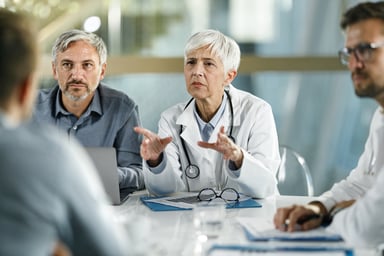 GettyImages-doctors talking_conference room