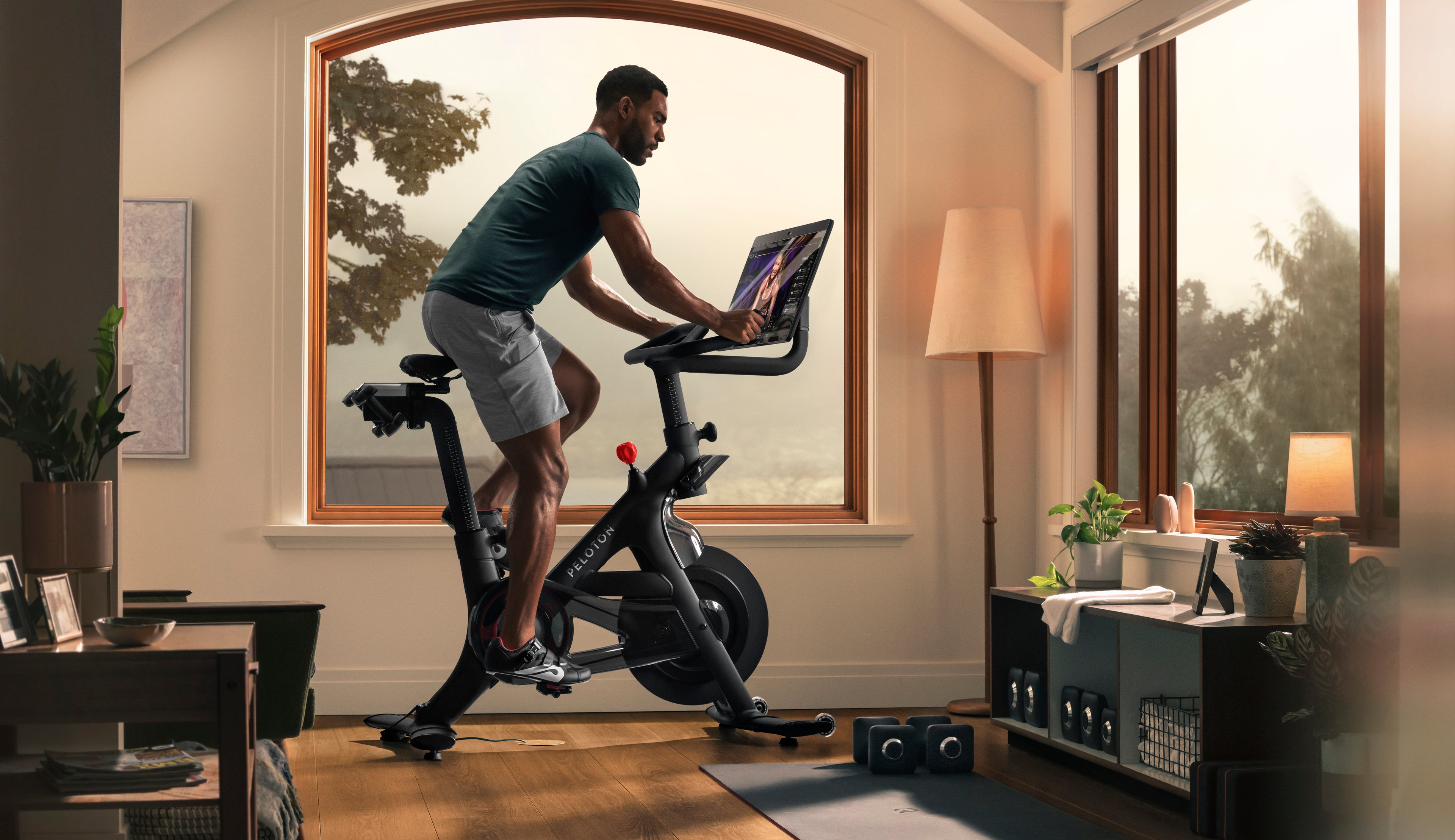 person riding excercise bike