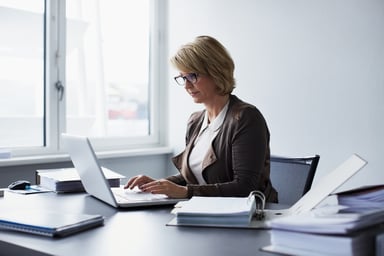 Middle aged woman laptop GettyImages-498323255 (1)