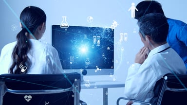 Scientists looking at screen with icons