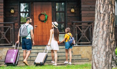 Family moving into a house.
