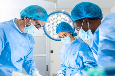 Physicians in an operating room.