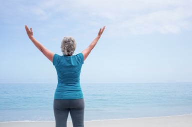 older woman doing yoga