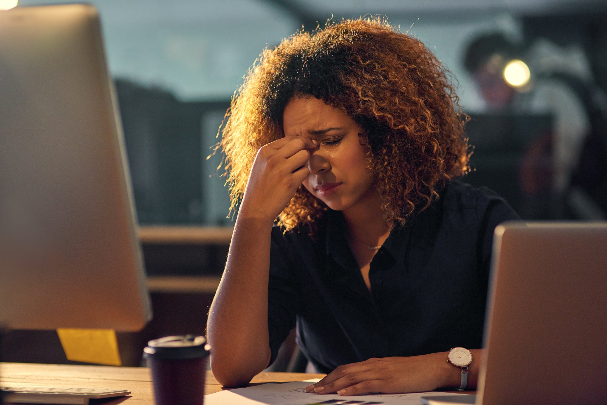 frustrated investor at computers
