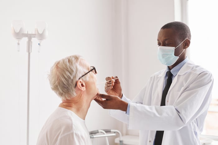 Doctor examining patient. 