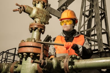 An engineer works at an oil rig.