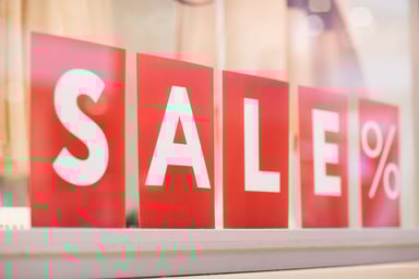 sale sign red letters