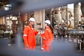 Oil rig workers talking