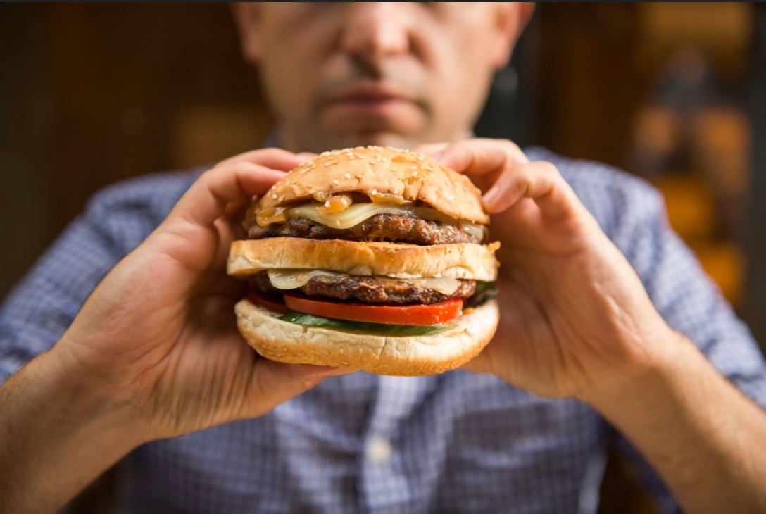 hamburger guy eating