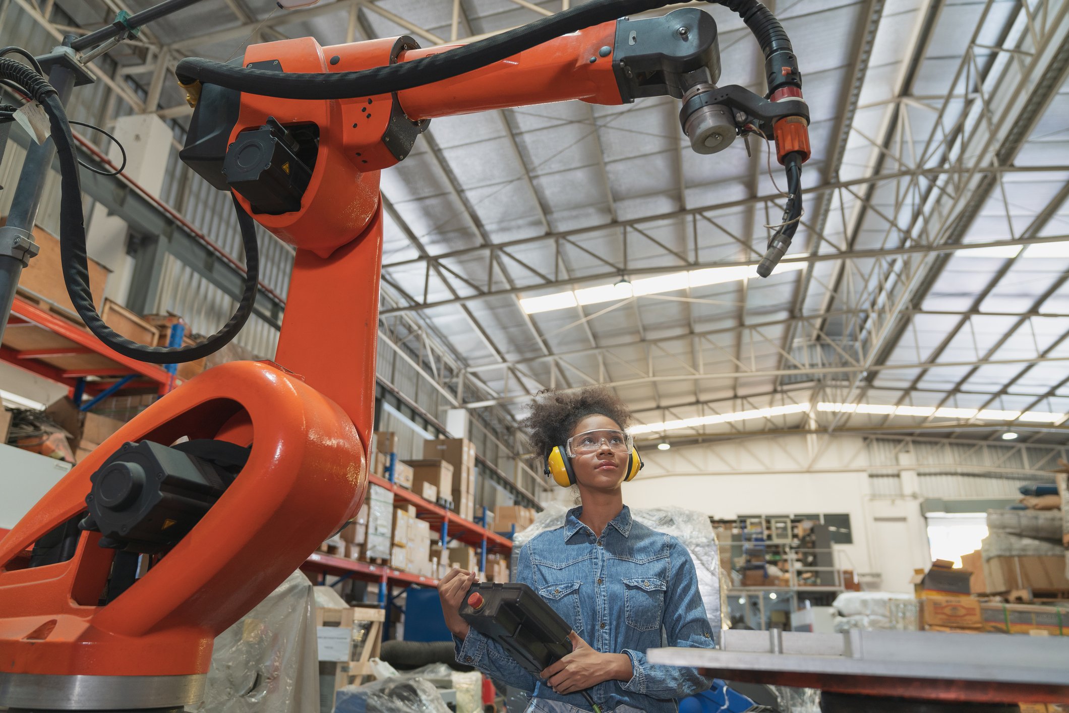 Warehouse robot with person in the background