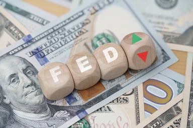 fed on blocks arrows up and down on money
