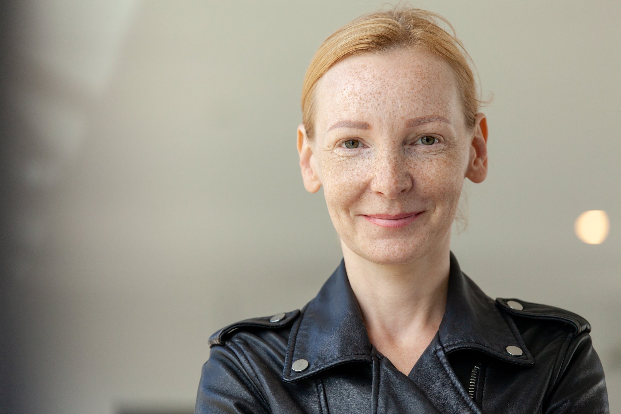 Someone is looking toward the camera, smiling. 