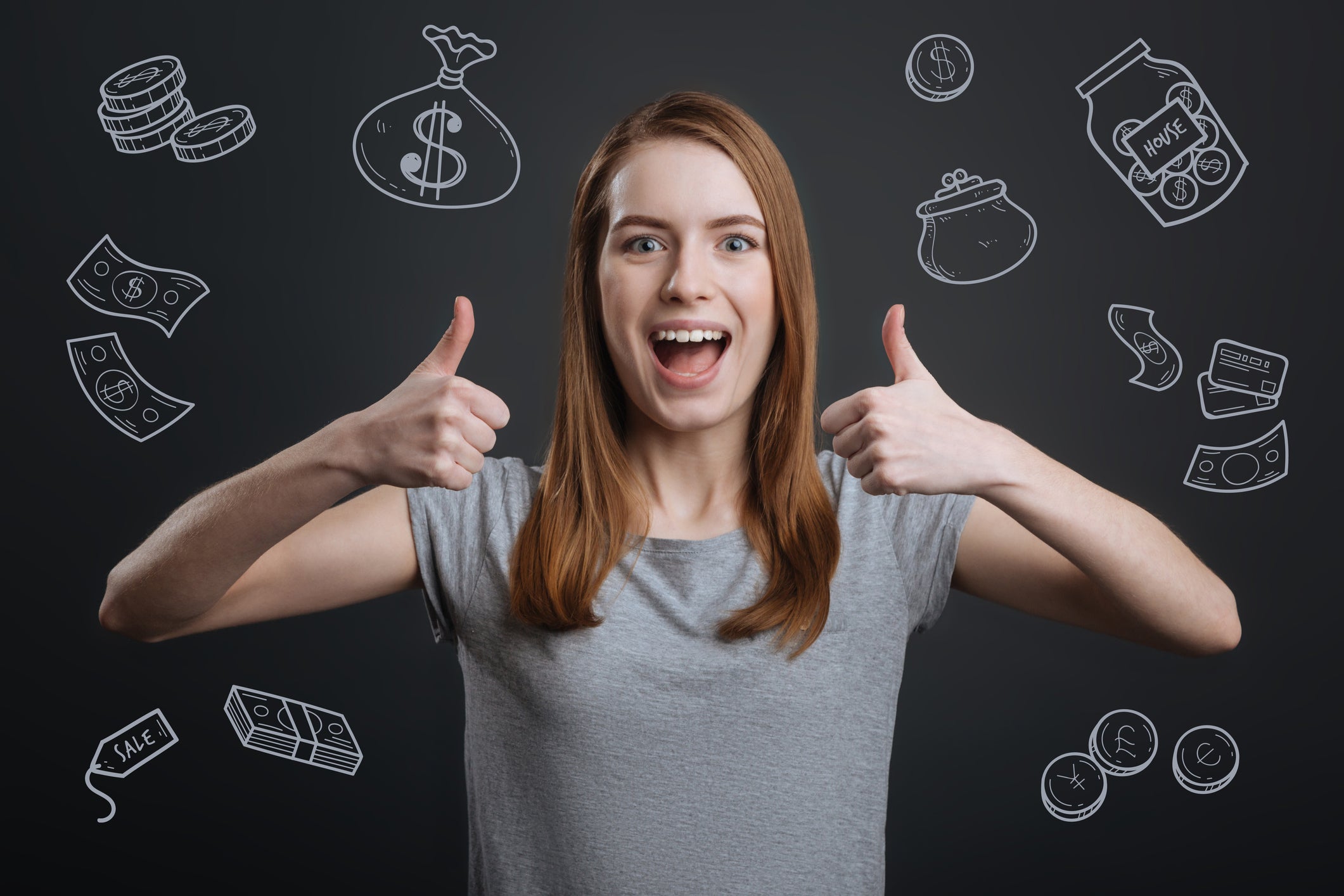 young-woman-holding-thumbs-up