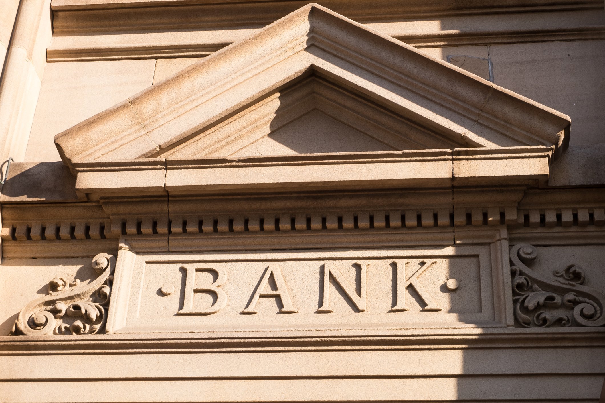 Sturdy masonry building reads BANK.